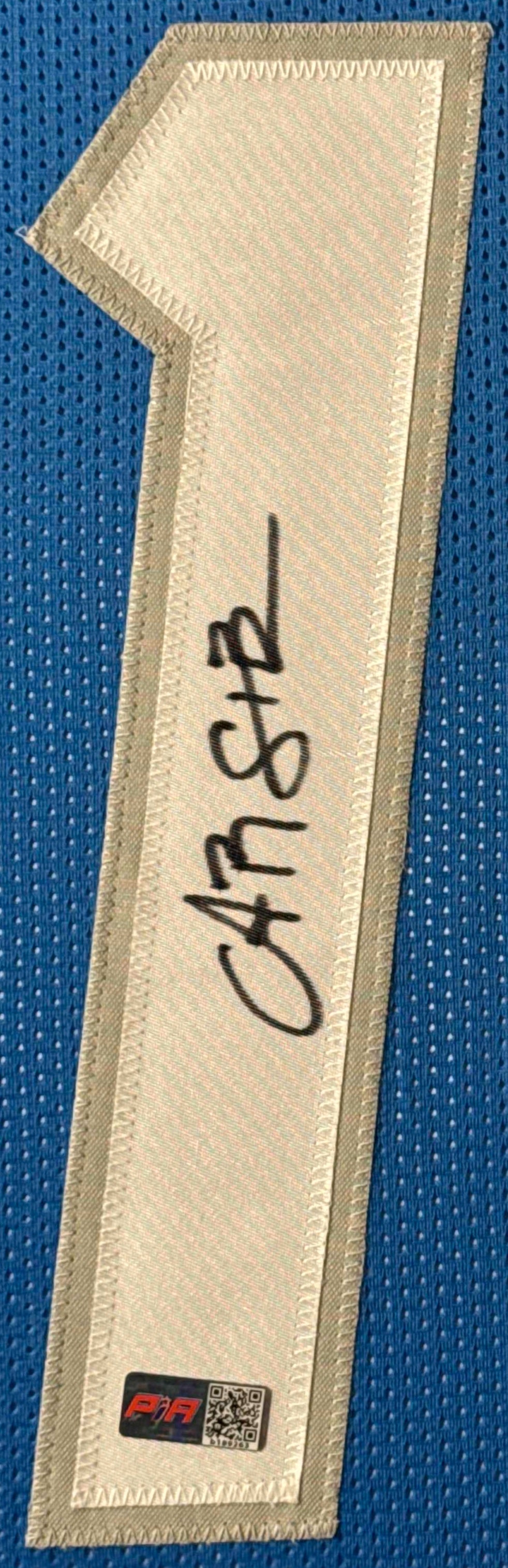 Amon-Ra St. Brown Signed Detroit Lions Jersey Framed PIA COA - Close up of Number